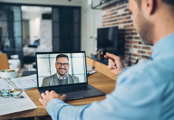 Two businessmen having a video conference